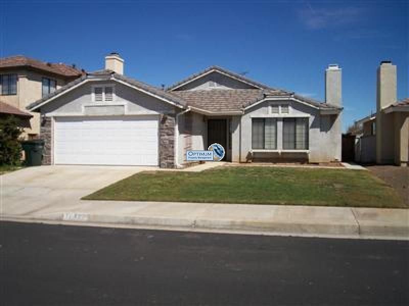 3-bedroom with wood floors and fireplace 1