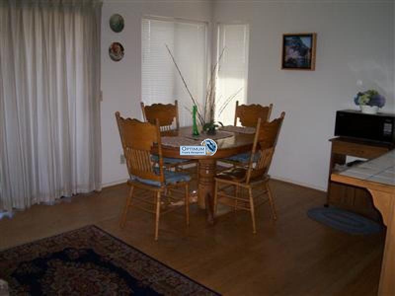 3-bedroom with wood floors and fireplace 5